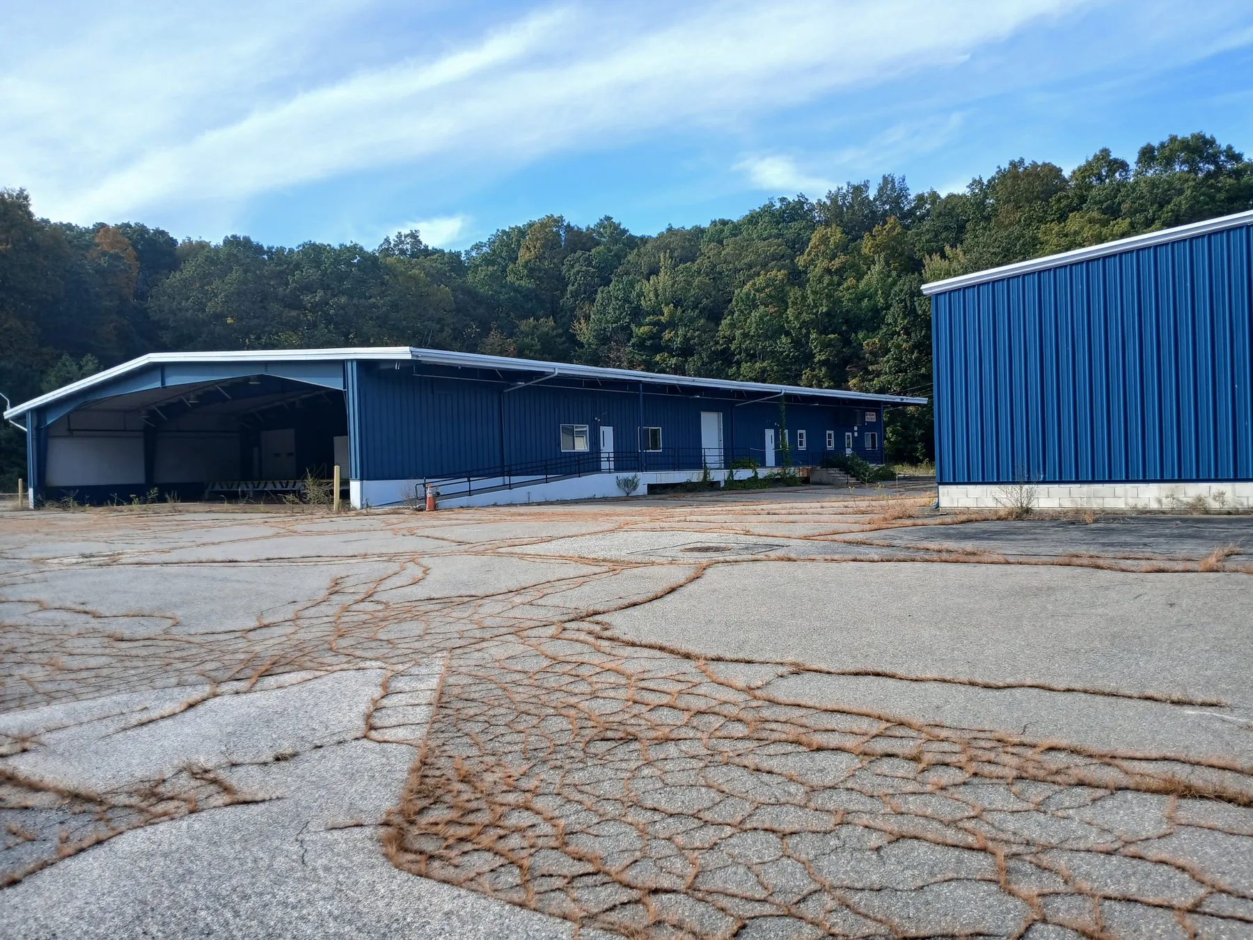 Large blue industrial building exterior